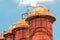 Sloss Furnaces National Historic Landmark, Birmingham Alabama USA, row of bright orange rusted blast furnaces against a blue sky