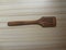 Slotted wooden spatula