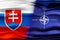 Slovakia and NATO flags - 3D illustration