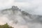 Slovakia - Ruin of castle Strecno. Beautiful autumn scenery of foggy valley in morning before sunrise. Europe. Beauty of nature