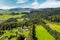 Slovakian town on forested hillside in summer