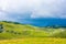 Slovenia velika planina big plateau, agriculture pasture land near city Kamnik in Slovenian Alps. Wooden houses on green land