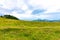 Slovenia velika planina big plateau, agriculture pasture land near city Kamnik in Slovenian Alps. Wooden houses on green land