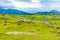 Slovenia velika planina big plateau, agriculture pasture land near city Kamnik in Slovenian Alps. Wooden houses on green land