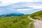 Slovenia velika planina big plateau, agriculture pasture land near city Kamnik in Slovenian Alps. Wooden houses on green land