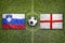 Slovenia vs. England flags on soccer field