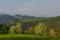 Slovenian breathtaking landscape with Julian Alps and charming little church of Sveti Tomaz Saint Thomas on a hill. Beautiful