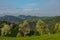 Slovenian breathtaking landscape with Julian Alps and charming little church of Sveti Tomaz Saint Thomas on a hill. Beautiful