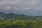 Slovenian breathtaking landscape with Julian Alps and charming little church of Sveti Tomaz Saint Thomas on a hill. Beautiful