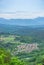 Slovenian countryside in spring with charming little village and Julian Alps in the background