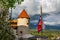 Slovenian national official flag on flagpole of Bled Castle, Slovenia
