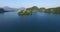 Slow aerial view of little island on the Slovenian lake Bled.