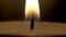 The slow approach of the candle flame