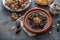 Slow cooked beef tajine with dates, raisins and almonds - moroccan cuisine, copy space