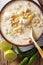 Slow cooker white chili chicken with beans and corn close-up on