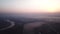 slow dramatic mystic fairy tale video from a height on an evening orange sunset.