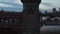 Slow follow Shot of Person walking through Bridge tunnel of Berlin Oberbaum Bridge, Medium Aerial tracking shot