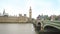 Slow horizontal pan of River Thames in Central London, out of focus