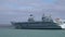 Slow medium clip of HMS Prince of Wales from a departing tour boat