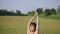 Slow motion Asian chinese female yoga yogi stretching in morning sun singapore