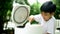 Slow motion Boy open rice cooker with smell good