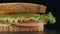 SLOW MOTION: Bread slice falls on a sandwich