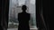 Slow motion clip of woman opening curtains on the view of Hong Kong, China