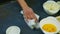 Slow motion closeup woman hands by kitchen rag clean table with white bowls