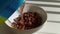 Slow motion of cocoa milk and chocolate cornflakes