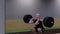 Slow motion of crossfit athlete performs clean and jerk