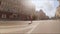 Slow motion defocused footage of female marathon runner running on street