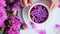 Slow motion Female hand holding cup of tea on bright table. Spring Seasonal valentine, woman, mother, 8 march holiday