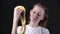 Slow motion footage of girl holding albino python