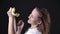 Slow motion footage of woman putting up albino python