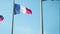 Slow motion of French flag fabric waving in front of blue sky 1920X1080 FullHD footage - Tricolor flag of France slow-mo