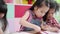 Slow motion - Group of children drawing in classroom, Multi-ethnic young boys and girls happy funny study and play painting on