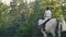 Slow motion: Horseback riding from horsewomen