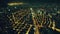 Slow motion illuminated night streets at Manila metropolis aerial view. Epic illuminated skyscrapers