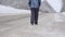 Slow Motion. Lonely Man Walking Snowy Road Away From Home in Thick Snowy Forest