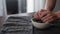 Slow motion man take fresh blueberries from white bowl on table