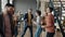 Slow motion of people business team dancing in workplace enjoying party