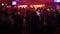 Slow Motion People Crowd Dance under Red Lights in Dark Hall