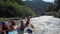 Slow motion people kayaking on mountain river.