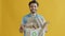 Slow motion portrait of responsible Arab guy holding box of cardboard with recycling symbol