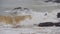 Slow-motion of sea wave with stone at Khao Laem Ya in Mu Ko Samet National Park, Rayong, Thailand