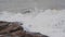 Slow-motion of sea wave with stone at Khao Laem Ya in Mu Ko Samet National Park, Rayong, Thailand