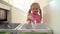 Slow Motion Sequence Of Girl Recycling Kitchen Waste In Bin