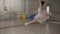 Slow motion shot. Charming ballerina makes a beautiful jump and continues her dance with steps and pirouettes