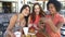 Slow Motion Shot Of Female Friends Taking Selfie In Cafï¿½