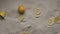 Slow Motion Shot of Flying Fresh Lemon Slices and Crushed on the sand commercial